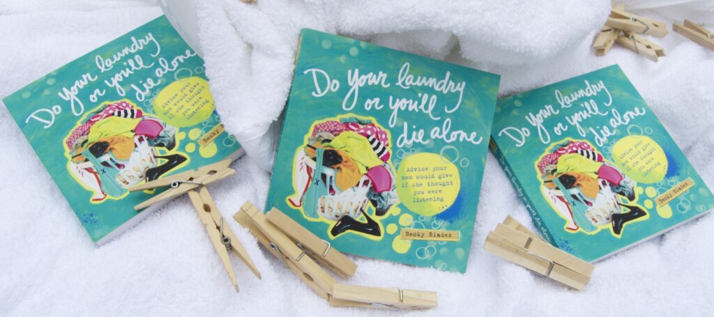 do your laundry or you'll die alone book with clothespins and fluffy white towels