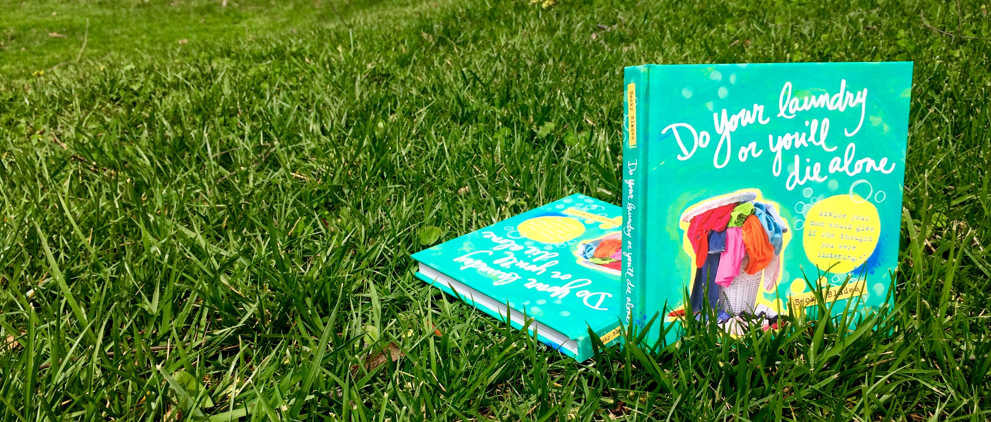 do your laundry or you'll die alone book on grass